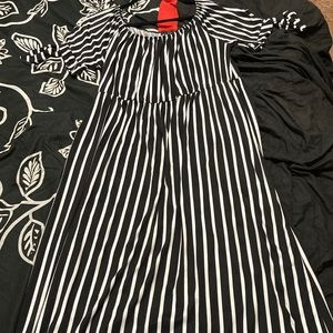 This is a long, a little off the shoulder black and white dress.